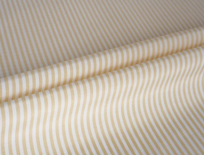 Applicering av slitstarkt och vackert garnfärgat hylsa fodertyg i avancerad kläddesign